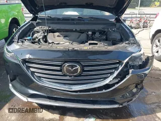 2021 Mazda CX-9 Carbon Edition with VIN JM3TCBDY3M0524241, listed as a IAAI auction lot 42538127 with 50,533 mi miles and . Bid and sale history available at DreamBid. Image 10.