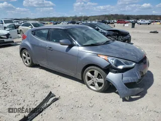 2014 Hyundai Veloster z VIN KMHTC6AD3EU215750, wystawiony jako Copart lot #52769165 z przebiegiem 114 364 mil mil oraz Szkoda całkowita • Salvage title. Historia ofert i sprzedaży dostępna na DreamBid. Obrazek 4.