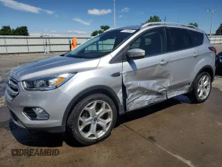 2019 Ford Escape Titanium с VIN 1FMCU9J90KUB85595, выставлен на аукционе Copart как лот 57410045 с пробегом 47 995 миль миль и Списание • Salvage title. История ставок и продаж доступна на DreamBid. Изображение 1.