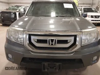 2011 Honda Pilot EX-L with VIN 5FNYF4H55BB039079, listed as a IAAI auction lot 42029278 with 173,216 mi miles. Bid and sale history available at carsss.com. Image 12.