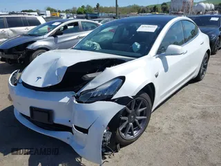 2020 Tesla Model 3 Long Range with VIN 5YJ3E1EB4LF619754, listed as a IAAI auction lot 41920422 with 82,430 mi miles and . Bid and sale history available at DreamBid. Image 18.