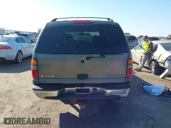 2002 Chevrolet Tahoe LT with VIN 1GNEC13Z12J233208, listed as a IAAI auction lot 41659873 with 238,922 mi miles and . Bid and sale history available at DreamBid. Image 16.