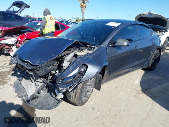2022 Tesla Model 3 with VIN 5YJ3E1EA3NF165054, listed as a IAAI auction lot 41805729 with 225,773 mi miles. Bid and sale history available at carsss.com. Image 20.