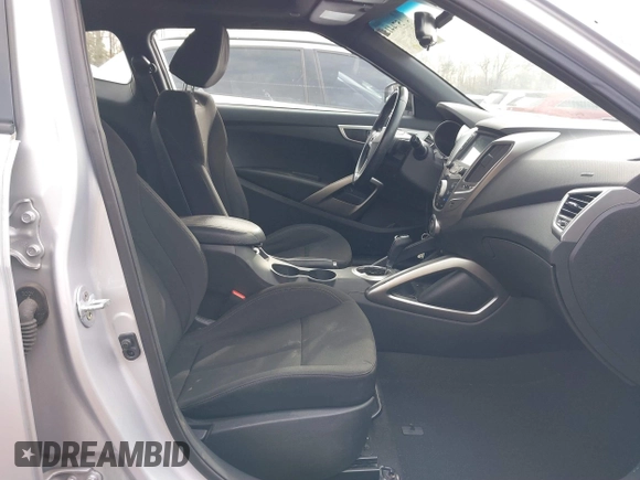 2017 Hyundai Veloster with VIN KMHTC6AD2HU324740, listed as a IAAI auction lot 41574415 with 66,685 mi miles. Bid and sale history available at carsss.com. Image 5.