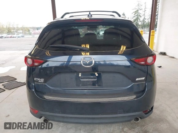 2018 Mazda CX-5 Grand Touring with VIN JM3KFBDM4J0302870, listed as a IAAI auction lot 41934217 with 57,151 mi miles. Bid and sale history available at carsss.com. Image 17.