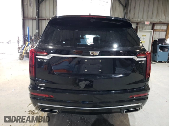2023 Cadillac XT6 AWD Premium Luxury with VIN 1GYKPFRS3PZ121942, listed as a Copart auction lot 46489545 with 35,453 mi miles and Salvage Title. Bid and sale history available at DreamBid. Image 6.