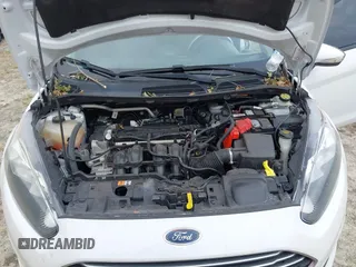 2017 Ford Fiesta SE with VIN 3FADP4BJXHM167605, listed as a IAAI auction lot 40510179 with 76,091 mi miles and . Bid and sale history available at DreamBid. Image 10.