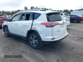 2018 Toyota RAV4 LE with VIN JTMBFREV5JJ738405, listed as a IAAI auction lot 41956145 with 100,593 mi miles and . Bid and sale history available at DreamBid. Image 3.