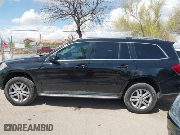 2014 Mercedes-Benz GL 450 z VIN 4JGDF7CE1EA342408, wystawiony jako IAAI lot #41968441 z przebiegiem 120 459 mil mil oraz . Historia ofert i sprzedaży dostępna na DreamBid. Obrazek 14.