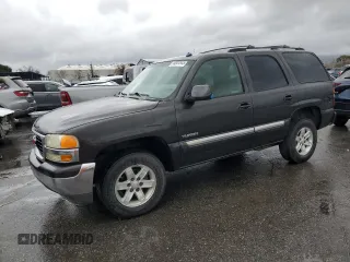 2005 GMC Yukon SLT with VIN 1GKEC13V95J176982, listed as a Copart auction lot 44934945 with 234,406 mi miles and Salvage Title. Bid and sale history available at carsss.com. Image 1.