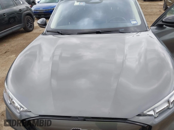 2023 Ford Mustang Mach-E Premium z VIN 3FMTK3SUXPMA84646, wystawiony jako IAAI lot #42202748 z przebiegiem 19 480 mil mil oraz . Historia ofert i sprzedaży dostępna na DreamBid. Obrazek 10.