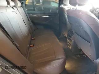 2014 BMW X5 xDrive50i z VIN 5UXKR6C57E0J71844, wystawiony jako Copart lot #54399675 z przebiegiem 79 898 mil mil oraz Szkoda całkowita • Salvage title. Historia ofert i sprzedaży dostępna na DreamBid. Obrazek 10.
