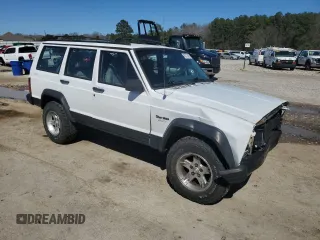 1995 Jeep Cherokee Sport with VIN 1J4FJ68S0SL646747, listed as a Copart auction lot 48772675 with 239,834 mi miles and Salvage title. Bid and sale history available at DreamBid. Image 4.