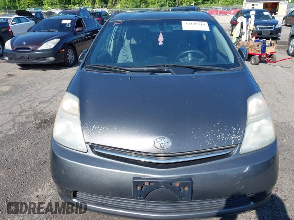 2007 Toyota Prius z VIN JTDKB20U473225645, wystawiony jako IAAI lot #42409516 z przebiegiem 154 050 mil mil oraz . Historia ofert i sprzedaży dostępna na DreamBid. Obrazek 6.