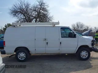2014 Ford Econoline Cargo Super Duty Commercial with VIN 1FTSE3EL2EDA22029, listed as a IAAI auction lot 42042836 with 217,942 mi miles. Bid and sale history available at carsss.com. Image 13.