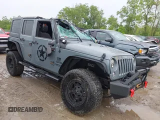 2014 Jeep Wrangler Unlimited Sport with VIN 1C4BJWDG1EL135073, listed as a IAAI auction lot 42435361 with 129,144 mi miles and . Bid and sale history available at DreamBid. Image 1.
