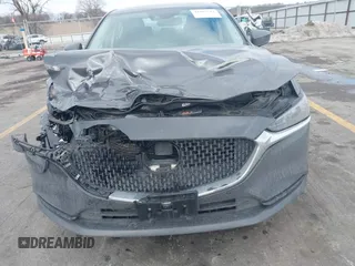 2020 Mazda 6 Grand Touring with VIN JM1GL1TY6L1525169, listed as a IAAI auction lot 41683512 with 73,313 mi miles and . Bid and sale history available at DreamBid. Image 6.