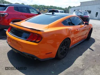 2020 Ford Mustang GT z VIN 1FA6P8CF5L5174647, wystawiony jako IAAI lot #42476619 z przebiegiem 42 728 mil mil oraz . Historia ofert i sprzedaży dostępna na DreamBid. Obrazek 4.
