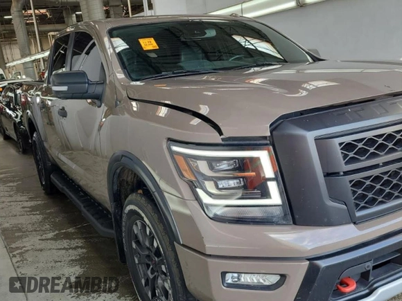 2021 Nissan Titan SV z VIN 1N6AA1ED9MN525289, wystawiony jako Copart lot #49928375 z przebiegiem 52 037 mil mil oraz Czysty tytuł • Clean title. Historia ofert i sprzedaży dostępna na DreamBid. Obrazek 3.