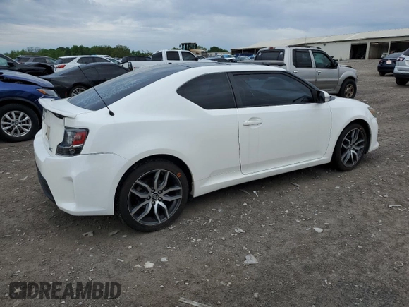 2014 Scion tC z VIN JTKJF5C70E3084411, wystawiony jako Copart lot #54255385 z przebiegiem 152 715 mil mil oraz Szkoda całkowita • Salvage title. Historia ofert i sprzedaży dostępna na DreamBid. Obrazek 3.