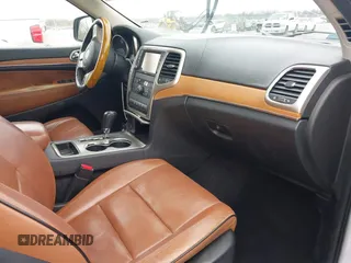 2013 Jeep Grand Cherokee Overland with VIN 1C4RJECG5DC648593, listed as a IAAI auction lot 41576630 with 187,098 mi miles. Bid and sale history available at carsss.com. Image 5.