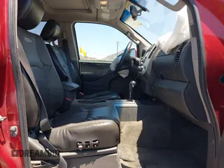 2015 Nissan Frontier SL with VIN 1N6AD0EV1FN711521, listed as a IAAI auction lot 42525352 with 203,114 mi miles and . Bid and sale history available at DreamBid. Image 5.
