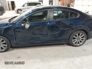 2021 Mazda 3 Select with VIN 3MZBPBBL3MM251893, listed as a IAAI auction lot 41854476 with 56,661 mi miles and . Bid and sale history available at DreamBid. Image 6.