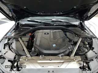 2021 BMW 4 Series M440i xDrive with VIN WBA13AR0XMCG68638, listed as a Copart auction lot 52142695 with 57,299 mi miles and Salvage Title. Bid and sale history available at DreamBid. Image 11.