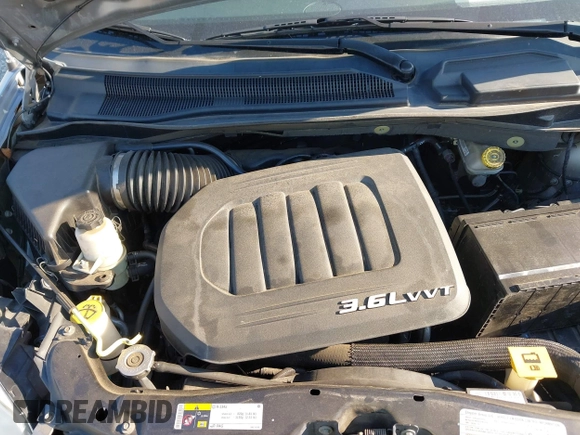2013 Dodge Grand Caravan SXT with VIN 2C4RDGCG3DR553217, listed as a IAAI auction lot 41898964 with 101,989 mi miles and . Bid and sale history available at DreamBid. Image 10.