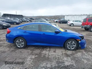2018 Honda Civic LX with VIN 2HGFC2F59JH610350, listed as a IAAI auction lot 41892911 with 115,501 mi miles and . Bid and sale history available at DreamBid. Image 14.