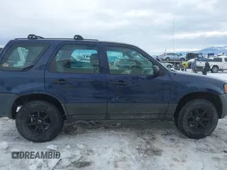 2003 Ford Escape XLS Popular with VIN 1FMYU92153KE01890, listed as a IAAI auction lot 41605087 with 109,411 mi miles. Bid and sale history available at carsss.com. Image 14.