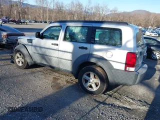 2007 Dodge Nitro SXT with VIN 1D8GU28K67W740794, listed as a IAAI auction lot 41591855 with 162,709 mi miles. Bid and sale history available at carsss.com. Image 3.