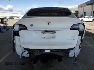 2021 Tesla Model Y Long Range z VIN 5YJYGDEE7MF228787, wystawiony jako Copart lot #47252275 z przebiegiem 59 823 mil mil oraz Szkoda całkowita • Salvage title. Historia ofert i sprzedaży dostępna na DreamBid. Obrazek 6.