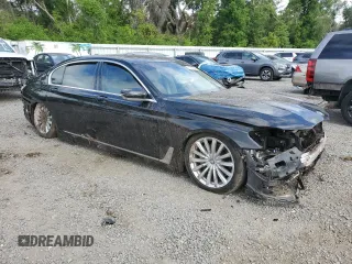 2017 BMW 7 Series 740i with VIN WBA7E2C50HG740358, listed as a Copart auction lot 51601995 with 0 mi miles and Non Repairable. Bid and sale history available at carsss.com. Image 4.