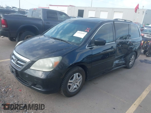 2007 Honda Odyssey EX-L with VIN 5FNRL38627B041332, listed as a IAAI auction lot 41934767 with 234,332 mi miles and . Bid and sale history available at carsss.com. Image 17.