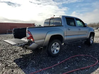2014 Toyota Tacoma with VIN 3TMLU4EN4EM156401, listed as a Copart auction lot 46001045 with 124,289 mi miles and Salvage Title. Bid and sale history available at carsss.com. Image 3.