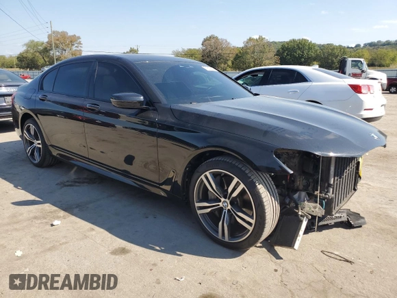 2019 BMW 7 Series 750i with VIN WBA7F0C56KGM25329, listed as a Copart auction lot 71613623 with 52,799 mi miles. Bid and sale history available at carsss.com. Image 4.