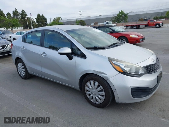 2014 Kia Rio LX with VIN KNADM4A3XE6363851, listed as a IAAI auction lot 42111189 with 144,122 mi miles and . Bid and sale history available at DreamBid. Image 1.