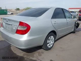 2004 Toyota Camry LE with VIN 4T1BE32K54U323478, listed as a IAAI auction lot 41725144 with 135,613 mi miles. Bid and sale history available at carsss.com. Image 4.