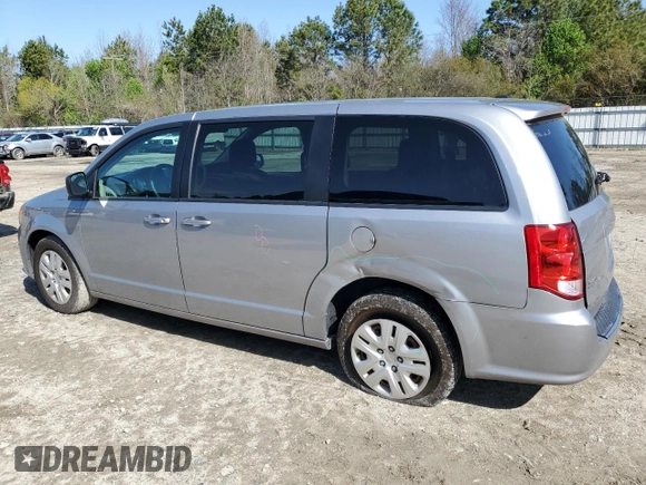 2018 Dodge Grand Caravan SE Plus with VIN 2C4RDGBG0JR136750, listed as a Copart auction lot 50957305 with 106,996 mi miles and Salvage Title. Bid and sale history available at DreamBid. Image 2.