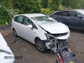 2015 Toyota Prius Two with VIN JTDZN3EU6FJ027888, listed as a IAAI auction lot 42410356 with 117,037 mi miles and . Bid and sale history available at DreamBid. Image 1.