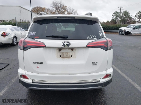 2017 Toyota RAV4 XLE with VIN JTMRFREV6HJ716907, listed as a IAAI auction lot 41056444 with 118,335 mi miles. Bid and sale history available at carsss.com. Image 16.
