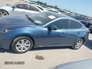 2016 Mazda 3 i Sport with VIN 3MZBM1T78GM285465, listed as a IAAI auction lot 42000874 with 71,272 mi miles and . Bid and sale history available at DreamBid. Image 14.