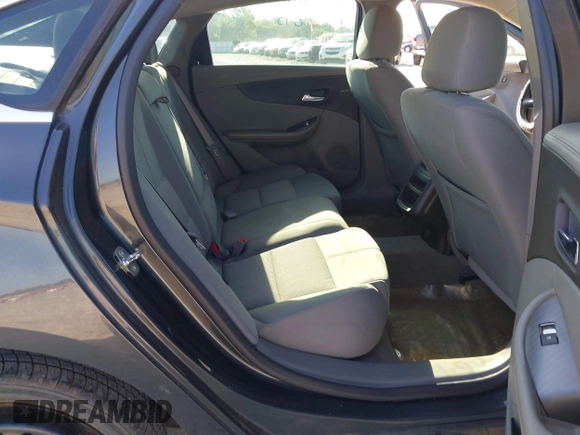 2014 Chevrolet Impala LS with VIN 2G11X5SLXE9174989, listed as a IAAI auction lot 42572065 with 309,311 mi miles and . Bid and sale history available at DreamBid. Image 8.
