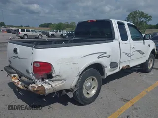 2000 Ford F-150 z VIN 2FTRX08W3YCA83858, wystawiony jako IAAI lot #42569957 z przebiegiem Nie podano mil oraz . Historia ofert i sprzedaży dostępna na DreamBid. Obrazek 4.