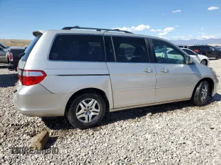 2007 Honda Odyssey EX-L z VIN 5FNRL38647B028078, wystawiony jako Copart lot #56208005 z przebiegiem 192 000 mil mil oraz Szkoda całkowita • Salvage title. Historia ofert i sprzedaży dostępna na DreamBid. Obrazek 3.