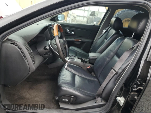 2003 Cadillac CTS with VIN 1G6DM57NX30146613, listed as a Copart auction lot 76741474 with 132,103 mi miles and Salvage Title. Bid and sale history available at carsss.com. Image 7.