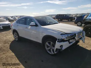 2017 BMW X4 xDrive28i with VIN 5UXXW3C38H0T79909, listed as a Copart auction lot 68994132 with NaN miles. Bid and sale history available at carsss.com. Image 4.