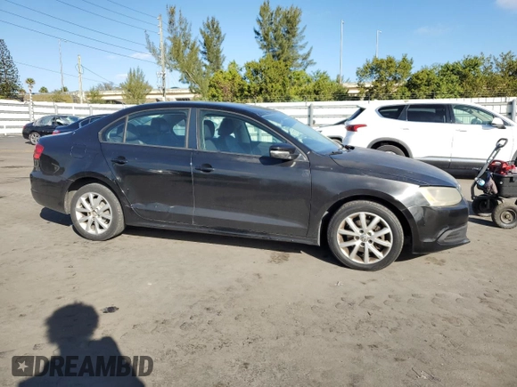 2012 Volkswagen Jetta Sedan SE w/Convenience with VIN 3VWDX7AJXCM340753, listed as a Copart auction lot 88157945 with 225,680 mi miles and Salvage Title. Bid and sale history available at carsss.com. Image 4.