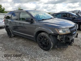 2017 Dodge Journey SXT z VIN 3C4PDDBG3HT703935, wystawiony jako Copart lot #57620915 z przebiegiem 126 915 mil mil oraz Szkoda całkowita • Salvage title. Historia ofert i sprzedaży dostępna na DreamBid. Obrazek 4.